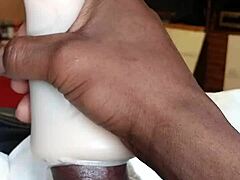 He discovered the TOY PUSSY hidden away and began his solo MASTURBATION session with intense focus.