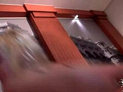 Blonde pornstar's silicone tits in hardcore action