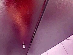 Emotional redhead handjob in shared hostel bathroom