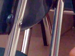 playful latina teases with her soles in the classroom setting.