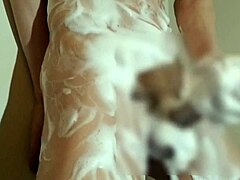 Young Japanese Boy Enjoys Bubbly Bath Time with Full Relaxation