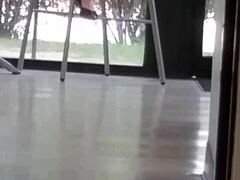 mature woman engages in shoe play with feet and shoes