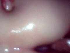 Oiled pussy fucked by cock in detailed scene