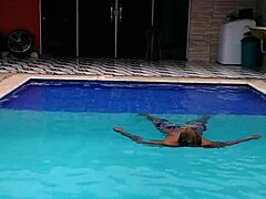 Just chilling by the pool, watching Pau splash around.