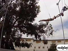 Those lovely badass babes are swinging naked outdoors