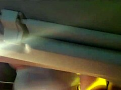 Brazilian woman boldly exposes breasts outside car in Porto Alegre public