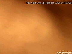 Brunette girl teases her lover with sensual dance moves