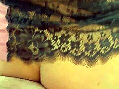 Curly blonde dances funk in kitchen pajamas