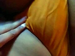 Indian wife feels deep pleasure as she enjoys her pussy and boobs being caressed. Her emotions overflow with passion during intimate moments.