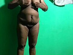 Indian horny milf wife uses umbrella for pleasure.