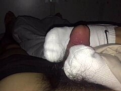 White stockings footjob ends with cumshot?