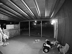 Wife and Husband on Back Porch with Open Gate