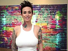 Short-haired chick with big tits devours a massive cock intensely