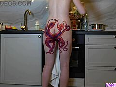 Inked housewife gets naughty in the kitchen