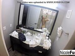 Nicole Aniston's seductive teasing with her big breasts and pubic area