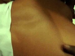 Ebony store clerk gives a sensual handjob to a big black cock
