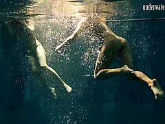 Teen brunette poses erotically in pool, contrasting underwater and above, russian babe bathing