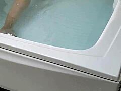 The sexy pornstar masturbates in the hydro massage bathtub, moaning as she touches her boobs and cock!