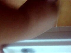 Chubby guys enjoying steamy handjob fun in the bath