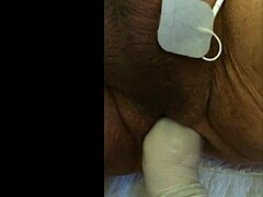 she's getting fisted with electrodes in this casual scene, feeling every intense sensation.