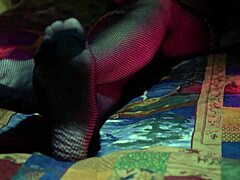 Perfect toes teasing in sexy fishnet stockings.