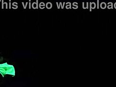 African-American woman engages in hardcore sex under black lights