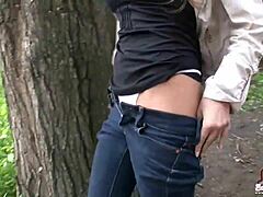 I'm your tomgirl neighbor rocking tight jeans with a flirty vibe.