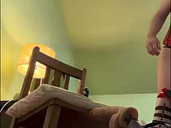 alikat2, the transsexual, plays with dildo on oak chair