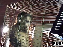 Sexy Dani Daniels acts as trapped bitch inside dog cage masturbating pussy and tits
