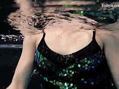 Adriana's solo outdoor swim in a revealing bikini