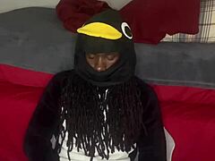 Guccicapone in onesie gives handjob to big black cock, leading to explosive cumshot in homemade scene