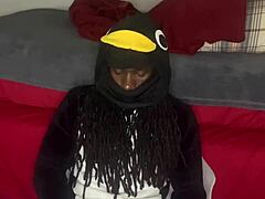 Guccicapone in onesie gives handjob to big black cock, leading to explosive cumshot in homemade scene