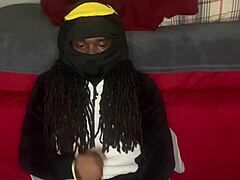 Guccicapone in onesie gives handjob to big black cock, leading to explosive cumshot in homemade scene