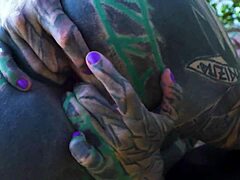 Outdoor solo masturbation with a tattooed model