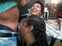 Lucky guy receives triple blowjob at public party.