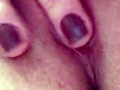 The sexy married woman gets wet while masturbating passionately.