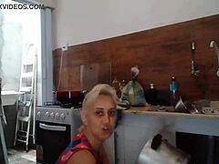 Stella cooking naked in the morning, showing big tits everywhere!