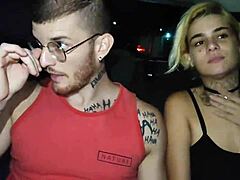 Two men engage in sexual activity within an Uber ride