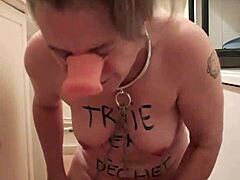 A chastity-bound slave explores the depths of her sexuality
