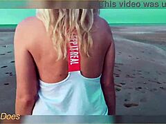 Flashing big tits under the glowing sunset by the shore