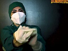Femdom in latex gloves for a medical fetish role-play