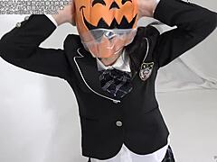 Masked Person Struggles To Remove Fetish Mask