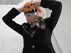 Masked Person Struggles To Remove Fetish Mask