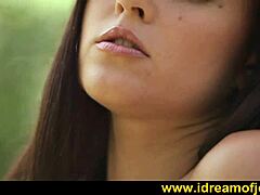 brunette masturbates in the woods