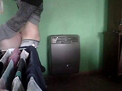 The amateur Latina MILF couple started fucking passionately right in the kitchen beside the heater