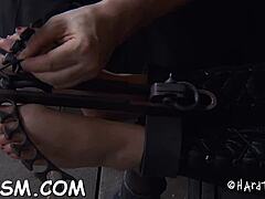 Handcuffed brunette babe degraded with toys in hardcore play