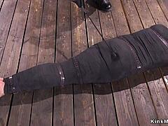 man, this mummified brunette is getting whipped hard in kinky bondage play