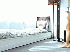 Cute blonde Empera inserts blue toy into wet small hole