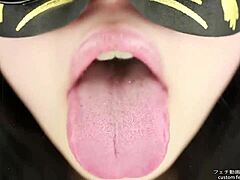 tongue fetish unfolds as asian beauty spits saliva in japanese style