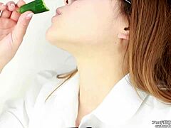 asian japanese women make sounds while eating cucumber
